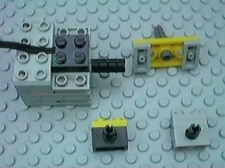 The four pieces of the motor assembly